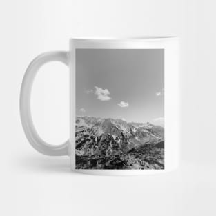 Rocky mountain peak and sky, black and white photography Mug